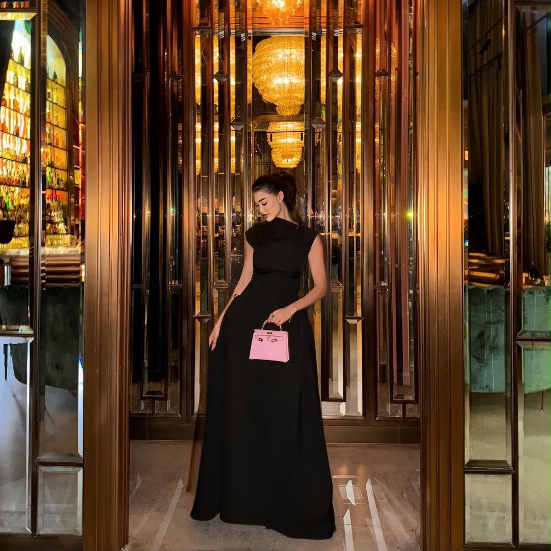 Asymmetric Black Evening Dress with Waist Cutouts and Metal Rings
