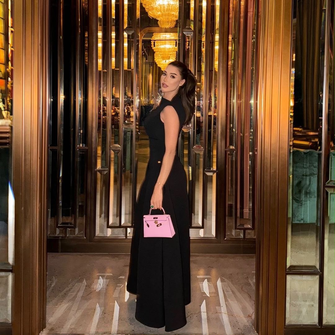 Asymmetric Black Evening Dress with Waist Cutouts and Metal Rings