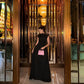 Asymmetric Black Evening Dress with Waist Cutouts and Metal Rings